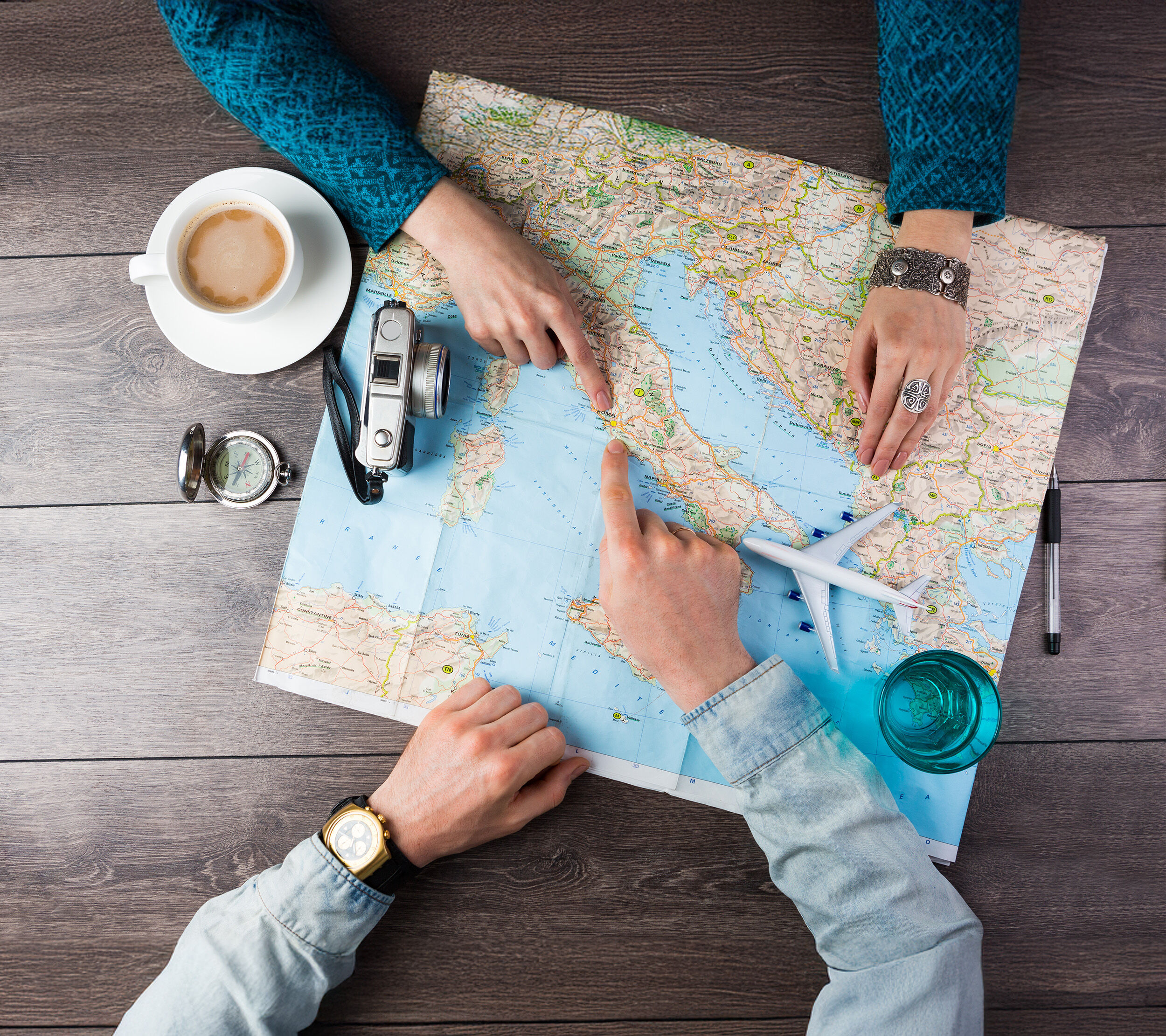 A couple choosing their honeymoon location